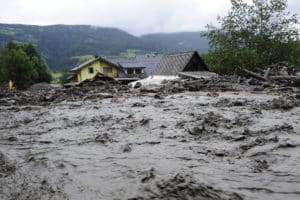 Houses trapped by flooding after heavy rains